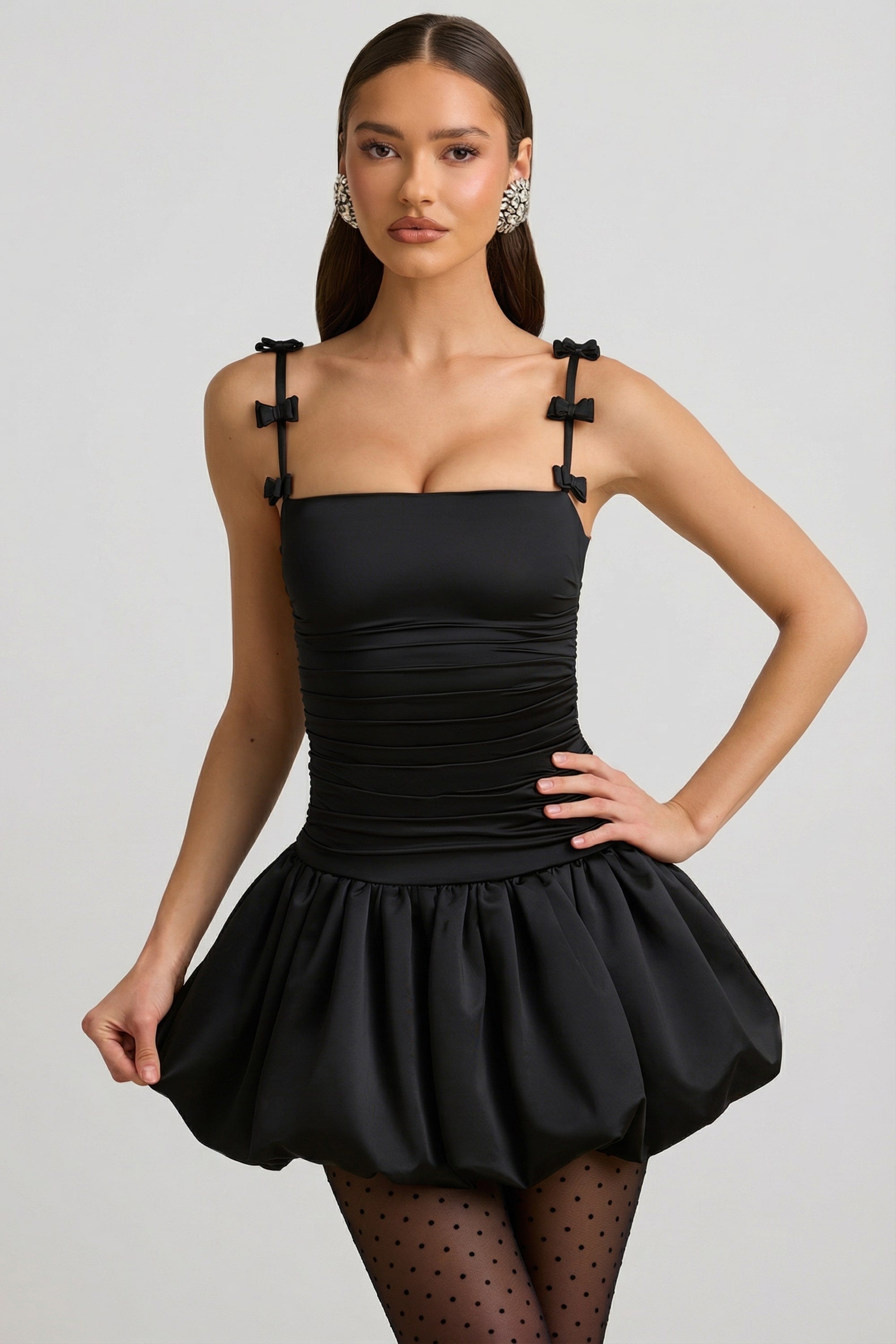 Bow-Detail Ruched Bubble Hem Mini Dress in Black